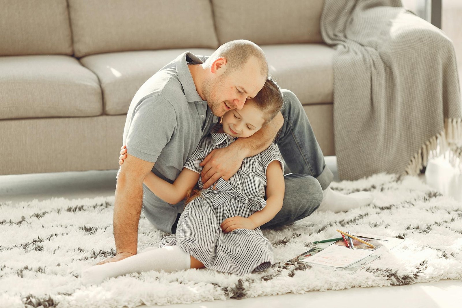 man hugging her daughter